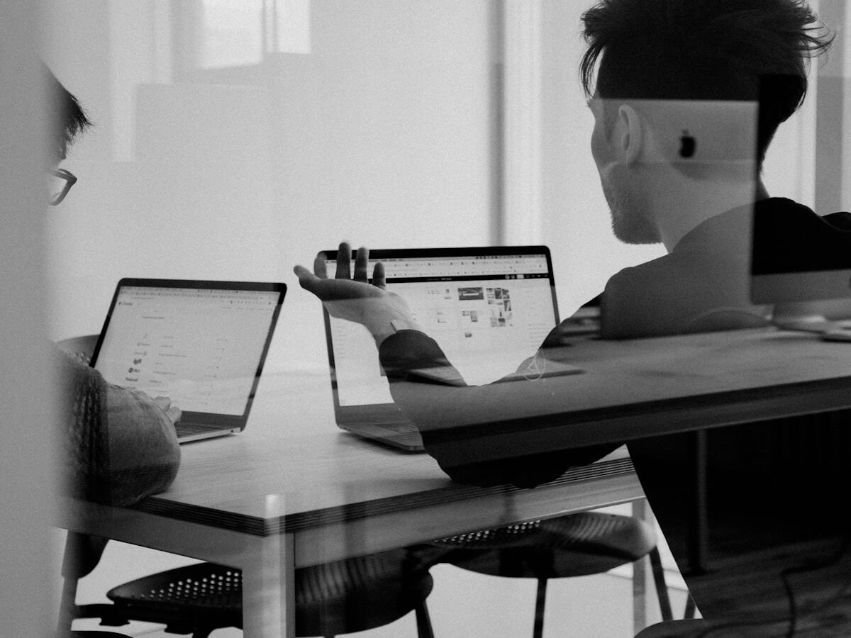 Specialists reviewing test automation and quality processes